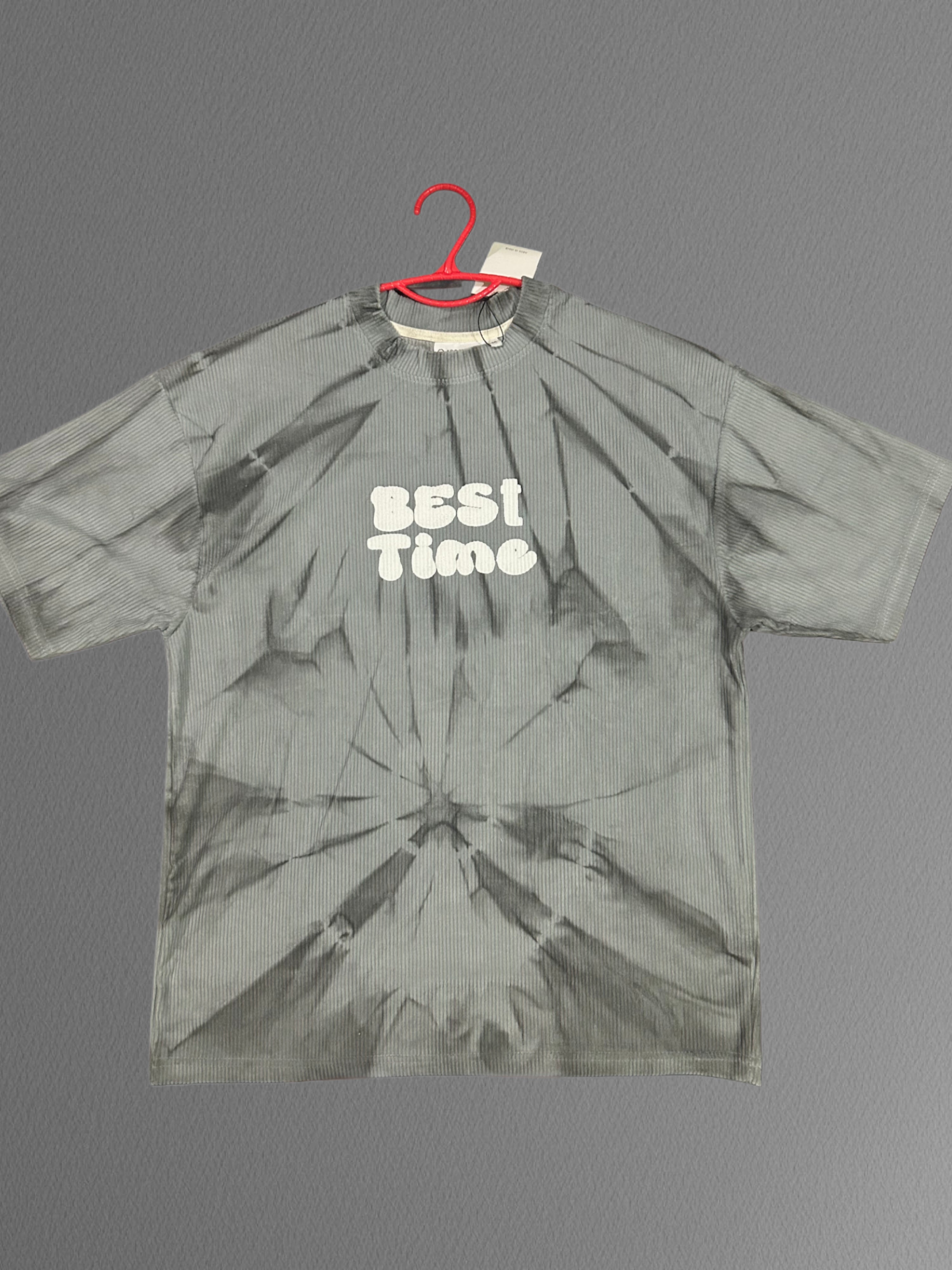 brown tie-dye t-shirt with a bold