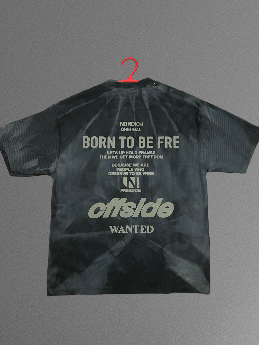 brown tie-dye t-shirt with a bold