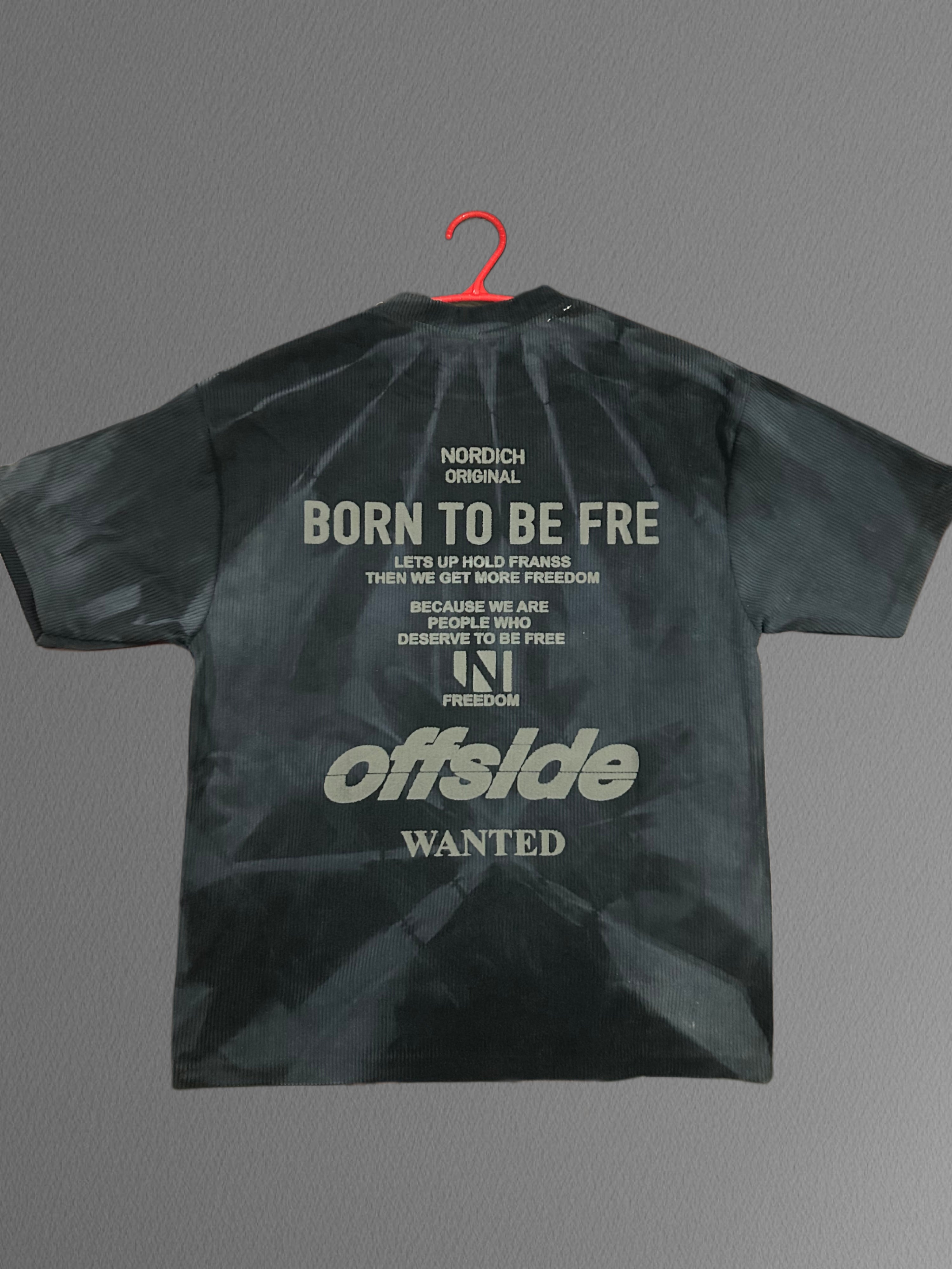 brown tie-dye t-shirt with a bold